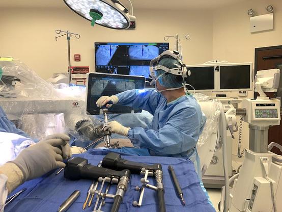 Surgeon performing surgery