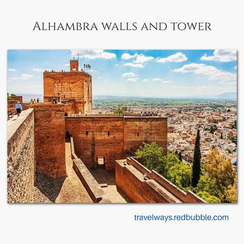 "Alhambra walls and tower" 
- The ancient stone walls towering over the Alhambra Palace and Moorish architectural complex overlook the city of Granada, Spain.