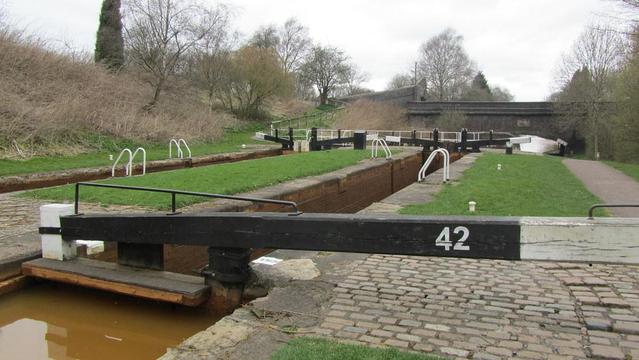 A photo titled "Lock 42 on the Trent and Mersey Canal", taken near Bridge 96, Poole Footbridge by David Jones on Flickr.