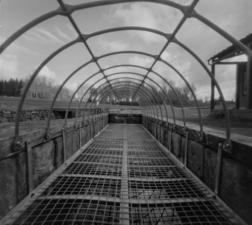 A black and white picture showing a trench where women did the laundry from the 18th century until early in the 20th century in Reykjavík.
