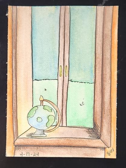 Globe sitting in the window sill