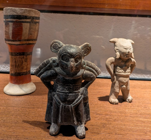 a clay whistle in the shape of a bat or moth, from the times of the Aztec empire
