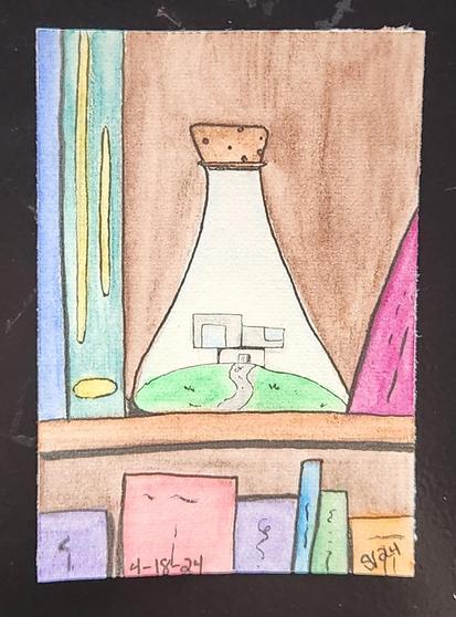 Tiny house in a terrarium on a bookshelf