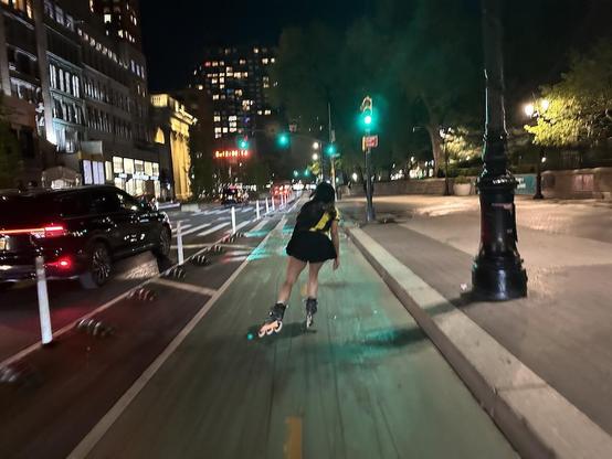 Hmmm, she's on three-wheel skates with larger radius. Attractive!