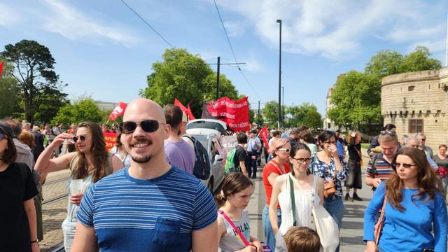 Me at the labor day demonstration in front of the section of my preferred political party (New Anticapitalist Party)