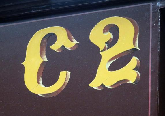 Ornamental lettering with block shadow