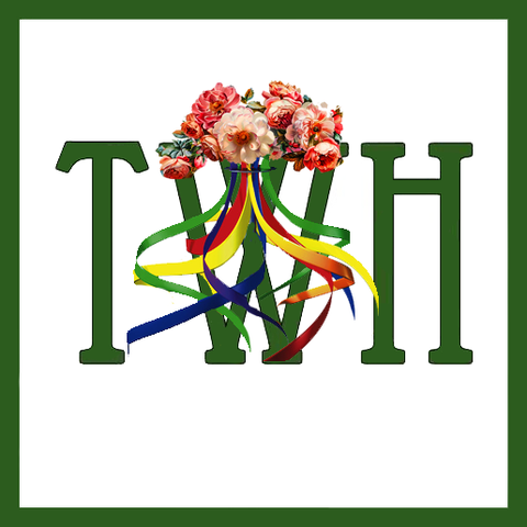The Wild Hunt's TWH logo with the W crowned with flowers and Beltaine ribbons.