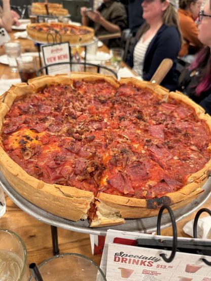 Pepperoni, sausage, bacon deep dish pizza