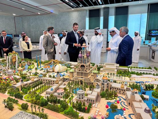 Eric Trump looks at the 3D model of Trump International Golf Club & Trump Villas project with Qatari Minister of Municipality & Chairman of Qatar Diar Abdullah Al Attiya.