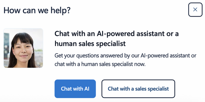 A pop-up box presenting two options: "Chat with AI" or "Chat with a sales specialist". 