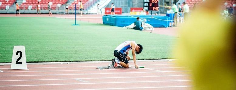 An athlete getting ready to run