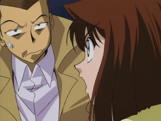 A scene from Yu☆Gi☆Oh! Duel Monsters Episode 4 showing Honda (Tristan Taylor) with a tired, unimpressed expression and a large sweat drop on his face, looking sideways at Anzu (Téa Gardner), who is speaking energetically with wide eyes. Their contrasting expressions highlight exhaustion and frustration—perfectly capturing the feeling of working the day after a public holiday.