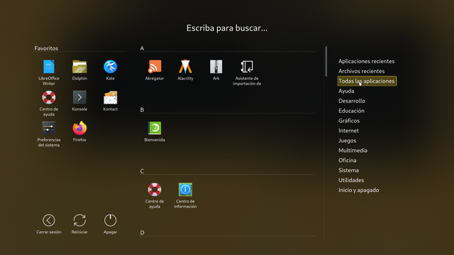Imagen de un menú de inicio a pantalla completa de un sistema operativo. Muestra iconos de aplicaciones, organizadas en categorías como Favoritos, Aplicaciones Recientes, y secciones para Ayuda, Desarrollo, Educación, etc.  También se incluyen opciones de  Cerrar sesión, Reiniciar y Apagar.  Hay un cuadro de búsqueda en la parte superior.
