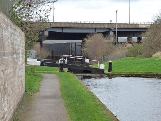 A photo titled "Titford Canal - Oldbury - Oldbury Locks - towards the M5 and the Bottom Lock", taken near Overhead Crossing, Stone Street by ell brown on Flickr.