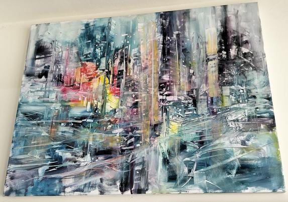 a painting, it is an abstract cityscape, energy swirling through at all different angles, it is dominant blue tinted, with sections of red and yellow and black areas