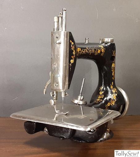 Singer model 24-24 chain stitch machine from the left end