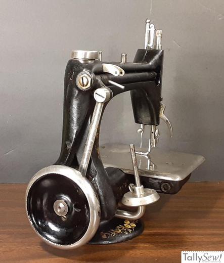 Singer model 24-24 chain stitch machine from the right end