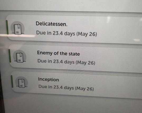 The library self-service terminal, after I borrowed 3 DVDs - it says for each one that it's "Due in 23.4 days"