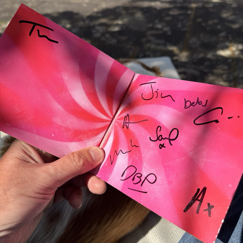 Inside cover of James Yummy signed by all band members.  
