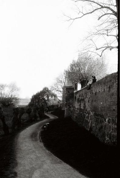 A path running along an old medieval wall
