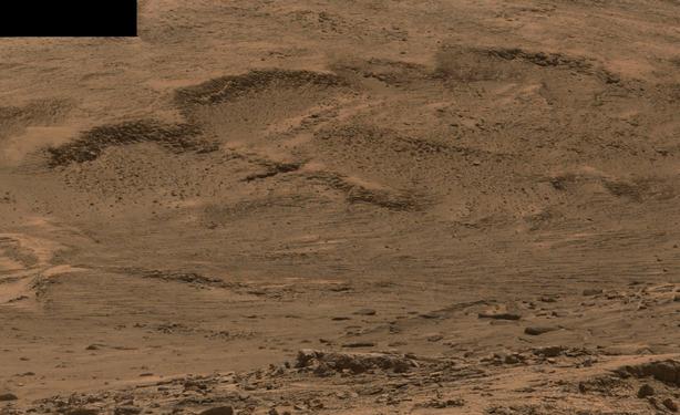 An ochre-toned mosaic capturing a Martian landscape.
