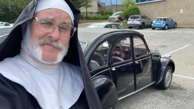 Photo of myself in nun drag with a Citroën 2CV
