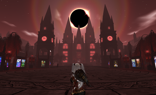 A woman with long white hair with an ornate hurdy gurdy strapped to her back looks away from the viewer  toward a wide stone plaza. The view is darkened because the sun, visible at the top of the image, is fully eclipsed. At the far side of the plaza, a tall stone building with large windows of many lights rises. It has many tall spires with pointed gables. Their windows and the clock faces on the two nearer towers glow red.