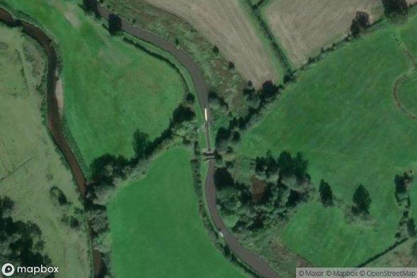 A satellite image of the area containing Lock 24, Weston Lock. Provided by MapBox.