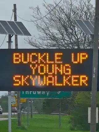highway sign: buckle up young skywalker