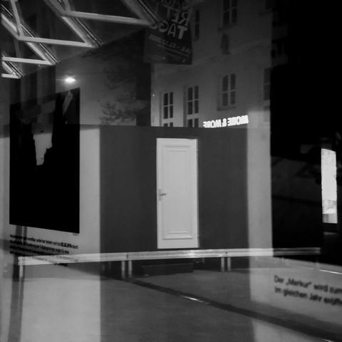 Black and white photo of mirror reflections 