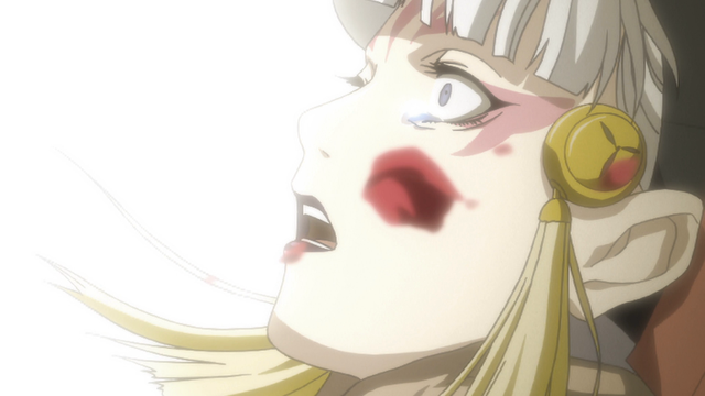 A woman with a distraught expression on her face due to something out of frame.