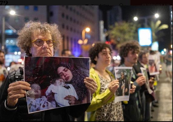 Israelis have joined silent vigils for slain Gazan children, holding up their photos