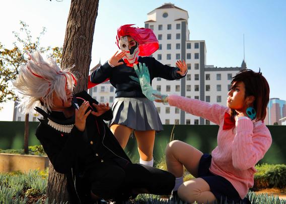 Group of three cosplayers in Dandadan cosplay.  