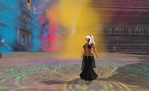 A woman with long white hair wearing a long black skirt stands in a wide stone paved square. The pavement is richly carved. Jets of coloured smoke in yellow, red, and blue are shooting up from the pavement behind her.