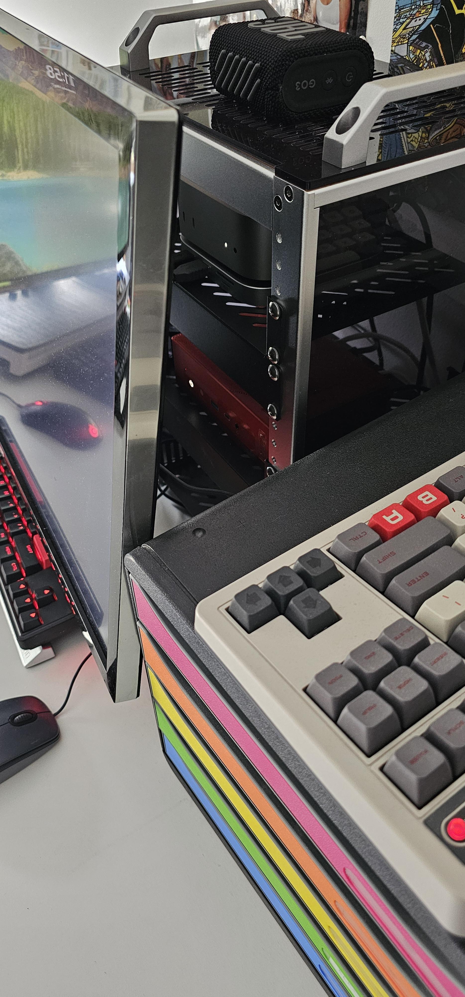 Photo of the DeskPi fully installed and plugged