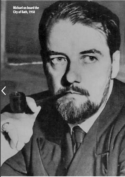 Michael Dillon, a white man with a beard smoking a pipe.