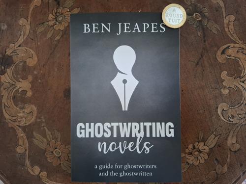 Cover of book on ghostwriting novels, with a round tuit.