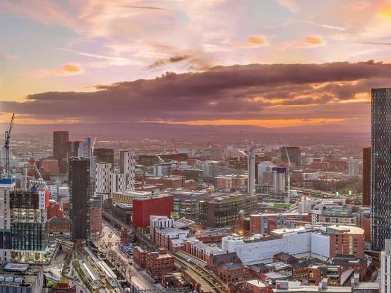 Manchester skyline including MMU Business school.