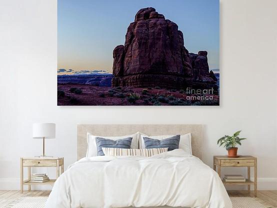 A large butte rock formation with the evening dusk light behind it after sunset in Arches National Park in Moab, Utah @fineartamerica @fineartamerica1 
https://5-jennifer-white.pixels.com/featured/arches-national-park-butte-sunset-jennifer-white.html
#buyintoart #fineart #artforsale #largeart


