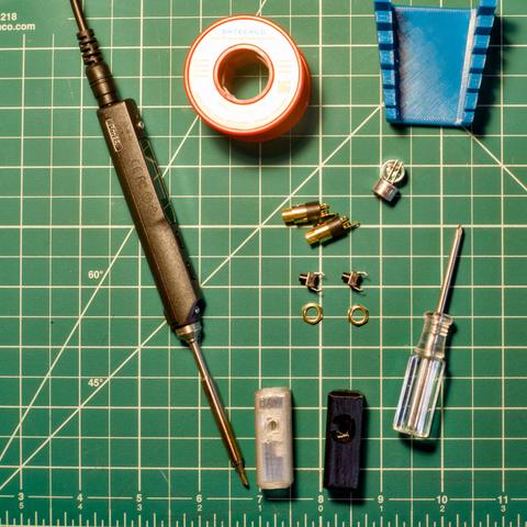 Flat lay of parts for assembling a QRP microphone