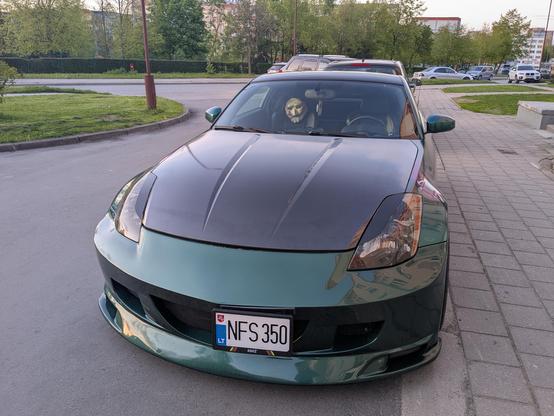 A car with the plate letters "NFS" and inside on one of the seats there's a jigsaw mask from the movie Saw