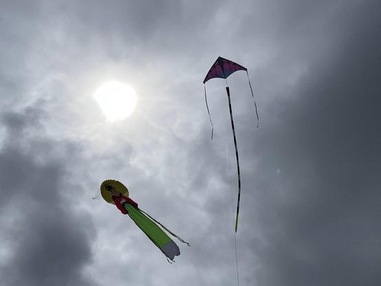 eChang the Moon Goddess kite and prism delta against a Norfolk sky and sun.