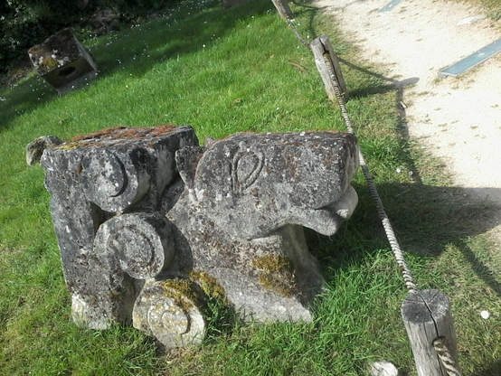 a stylized sheep (?) sculpted out of stone