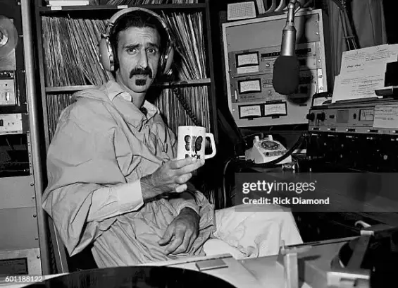Frank Zappa Visits WKLS 96 Rock Atlanta
ATLANTA - October 25: Singer/Songwriter Frank Zappa plays DJ for a day at WKLS 96 Rock in Atlanta Georgia. October 25, 1981 (Photo By Rick Diamond/Getty Images)