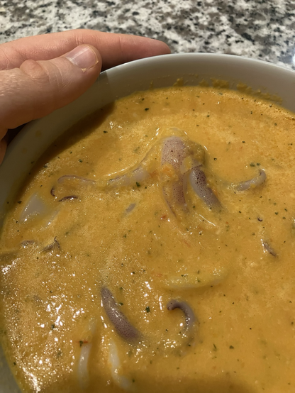 Close up of squid in soup