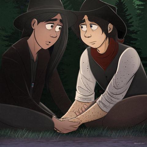 Alex holding Ezra's hands