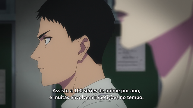 A imagem mostra um close do rosto de Masashi Nishiki de Go! Go! Loser Ranger. Ele é um jovem com cabelo curto e escuro, penteado de forma simples. Sua expressão é séria e um pouco pensativa, com os olhos ligeiramente baixos. A pele é clara e seus traços faciais são suaves. Ele parece estar usando uma camisa de cor clara, possivelmente branca ou cinza-clara, sob uma jaqueta escura, mas apenas uma pequena parte da roupa é visível. O fundo é escuro e desfocado, sem detalhes específicos, focando toda a atenção no rosto do personagem. O estilo artístico é o típico de anime, com traços limpos e cores sóbrias. A imagem transmite uma sensação de calma e introspecção.

A imagem possue a legenda: "Assisto a 100 séries de anime por ano, e muitas envolvem repetições no tempo."