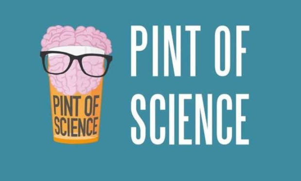 A cartoon image of a pint of beer wearing glasses and with a brain half submerged. On the glass and to the right are written "Pint of Science". The background is blue-teal colour.
