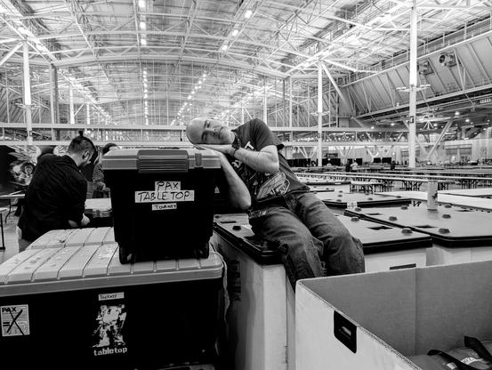 Tabletop manager asleep atop freight