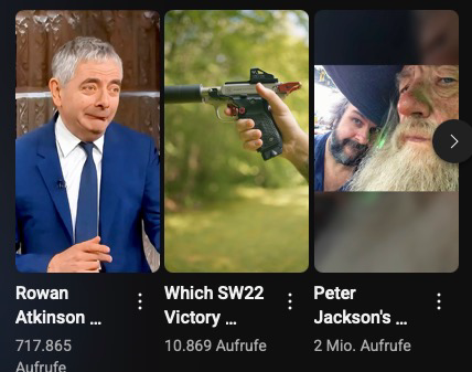 Youtube Short where a pistol of one video shots in the head of mr bean shown in another videos thumbnail
